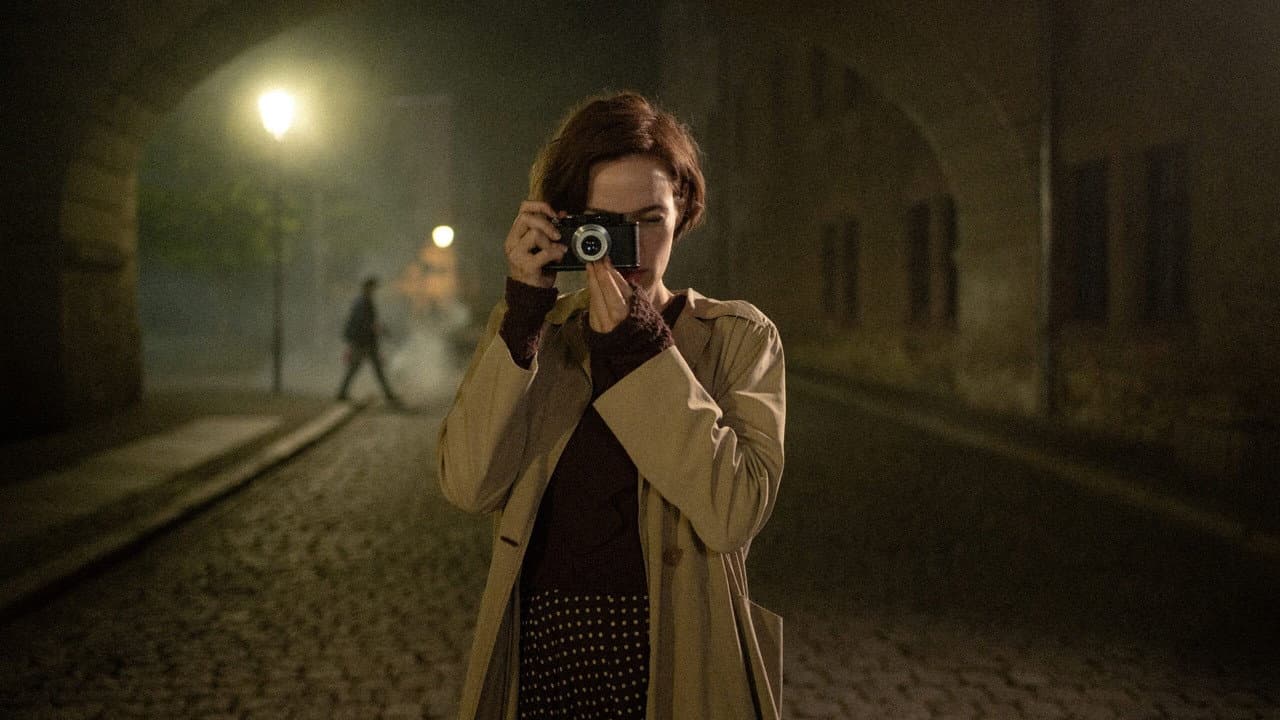 The Girl with the Leica Banner