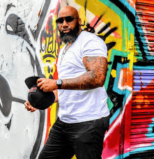 Dwayne “DJ Beloved” Tennant